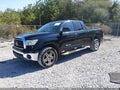 2010 Toyota Tundra — photo 2 of 16 | VIN 5TFRM5F14AX010371