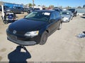 2011 Volkswagen Jetta — photo 2 of 16 | VIN 3VW2K7AJ0BM094039