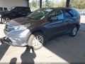 2015 Honda CR-V — photo 2 of 16 | VIN 2HKRM4H75FH637577