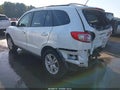 2011 Hyundai Santa Fe — photo 3 of 19 | VIN 5XYZH4AG2BG061866