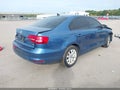 2015 Volkswagen Jetta — photo 4 of 18 | VIN 3VWD17AJ5FM301154