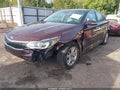 2016 Kia Optima — photo 2 of 13 | VIN 5XXGT4L36GG118498