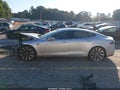2014 Tesla Model S — photo 13 of 15 | VIN 5YJSA1H14EFP50373