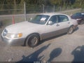 1999 Lincoln Town Car — photo 2 of 11 | VIN 1LNHM82W3XY685061