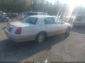 1999 Lincoln Town Car — photo 4 of 11 | VIN 1LNHM82W3XY685061
