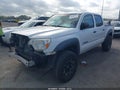 2014 Toyota Tacoma — photo 2 of 16 | VIN 5TFJX4GN2EX032150