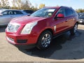 2015 Cadillac SRX — photo 2 of 16 | VIN 3GYFNEE34FS630515