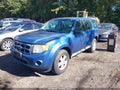 2009 Ford Escape — photo 2 of 10 | VIN 1FMCU92749KC81717