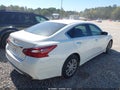 2018 Nissan Altima — photo 4 of 18 | VIN 1N4AL3AP4JC247021