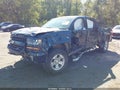 2018 Chevrolet Silverado 1500 — photo 2 of 16 | VIN 3GCUKREC2JG556617