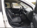 2014 Jeep Compass — photo 5 of 12 | VIN 1C4NJDBB7ED728228