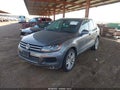 2012 Volkswagen Touareg — photo 2 of 12 | VIN WVGEK9BP9CD006807