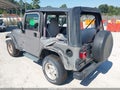 2002 Jeep Wrangler — photo 3 of 9 | VIN 1J4FA29P02P701242