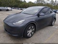 2022 Tesla Model Y — photo 2 of 20 | VIN 7SAYGDEE4NF401704