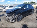 2025 Tesla Model Y — photo 2 of 15 | VIN 7SAYGDEF3SA373606
