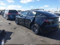 2025 Tesla Model Y — photo 3 of 15 | VIN 7SAYGDEF3SA373606