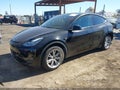 2022 Tesla Model Y — photo 2 of 19 | VIN 7SAYGDEE7NF411918
