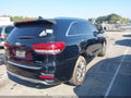 2016 Kia Sorento — photo 4 of 16 | VIN 5XYPK4A59GG031990
