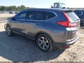 2018 Honda CR-V — photo 3 of 16 | VIN 5J6RW1H59JL012931