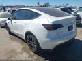 2023 Tesla Model Y — photo 3 of 15 | VIN 7SAYGDEE4PF614364