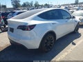 2023 Tesla Model Y — photo 4 of 15 | VIN 7SAYGDEE4PF614364
