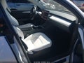 2023 Tesla Model Y — photo 5 of 15 | VIN 7SAYGDEE4PF614364