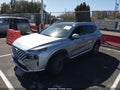 2021 Hyundai Santa Fe — photo 2 of 15 | VIN 5NMS44ALXMH325757