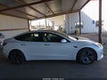 2022 Tesla Model 3 — photo 12 of 15 | VIN 5YJ3E1EA1NF302119