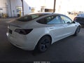 2022 Tesla Model 3 — photo 4 of 15 | VIN 5YJ3E1EA1NF302119