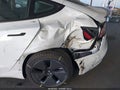 2022 Tesla Model 3 — photo 6 of 15 | VIN 5YJ3E1EA1NF302119