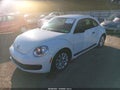 2014 Volkswagen Beetle — photo 2 of 11 | VIN 3VWF17AT2EM657862