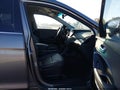 2014 Hyundai Santa Fe — photo 5 of 16 | VIN 5XYZUDLA5EG224809