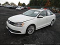 2014 Volkswagen Jetta — photo 2 of 11 | VIN 3VWLL7AJ2EM445877