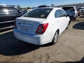 2013 Chevrolet Sonic — photo 4 of 16 | VIN 1G1JC5SH1D4250544
