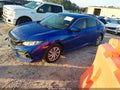 2016 Honda Civic — photo 2 of 17 | VIN 19XFC2F58GE060108