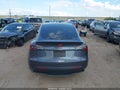 2023 Tesla Model Y — photo 14 of 14 | VIN 7SAYGDEE1PA165349