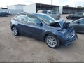 2023 Tesla Model Y — photo 1 of 14 | VIN 7SAYGDEE1PA165349
