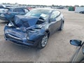 2023 Tesla Model Y — photo 2 of 14 | VIN 7SAYGDEE1PA165349