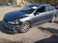 2014 Volkswagen Jetta — photo 2 of 16 | VIN 3VWD17AJ5EM384535
