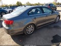 2014 Volkswagen Jetta — photo 4 of 16 | VIN 3VWD17AJ5EM384535