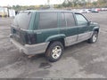 1998 Jeep Grand Cherokee — photo 4 of 11 | VIN 1J4GZ58S0WC314921