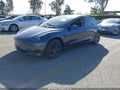 2023 Tesla Model 3 — photo 2 of 19 | VIN 5YJ3E1EA9PF658546