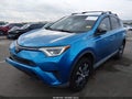 2018 Toyota RAV4 — photo 2 of 16 | VIN 2T3ZFREV2JW456626