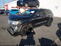 2011 Jeep Grand Cherokee — photo 2 of 17 | VIN 1J4RR4GG5BC519094