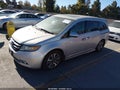 2014 Honda Odyssey — photo 2 of 15 | VIN 5FNRL5H99EB054498