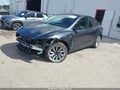 2026 Tesla Model Y — photo 2 of 18 | VIN 7SAYGDED0TA451047