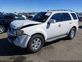 2012 Ford Escape — photo 2 of 16 | VIN 1FMCU0EG7CKA64337