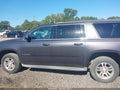 2015 Chevrolet Suburban 1500 — photo 14 of 16 | VIN 1GNSCJKC4FR602781