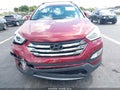2014 Hyundai Santa Fe — photo 6 of 16 | VIN 5XYZU3LB6EG218875