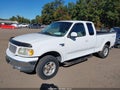 2002 Ford F-150 — photo 2 of 12 | VIN 1FTRX18W62KA29947